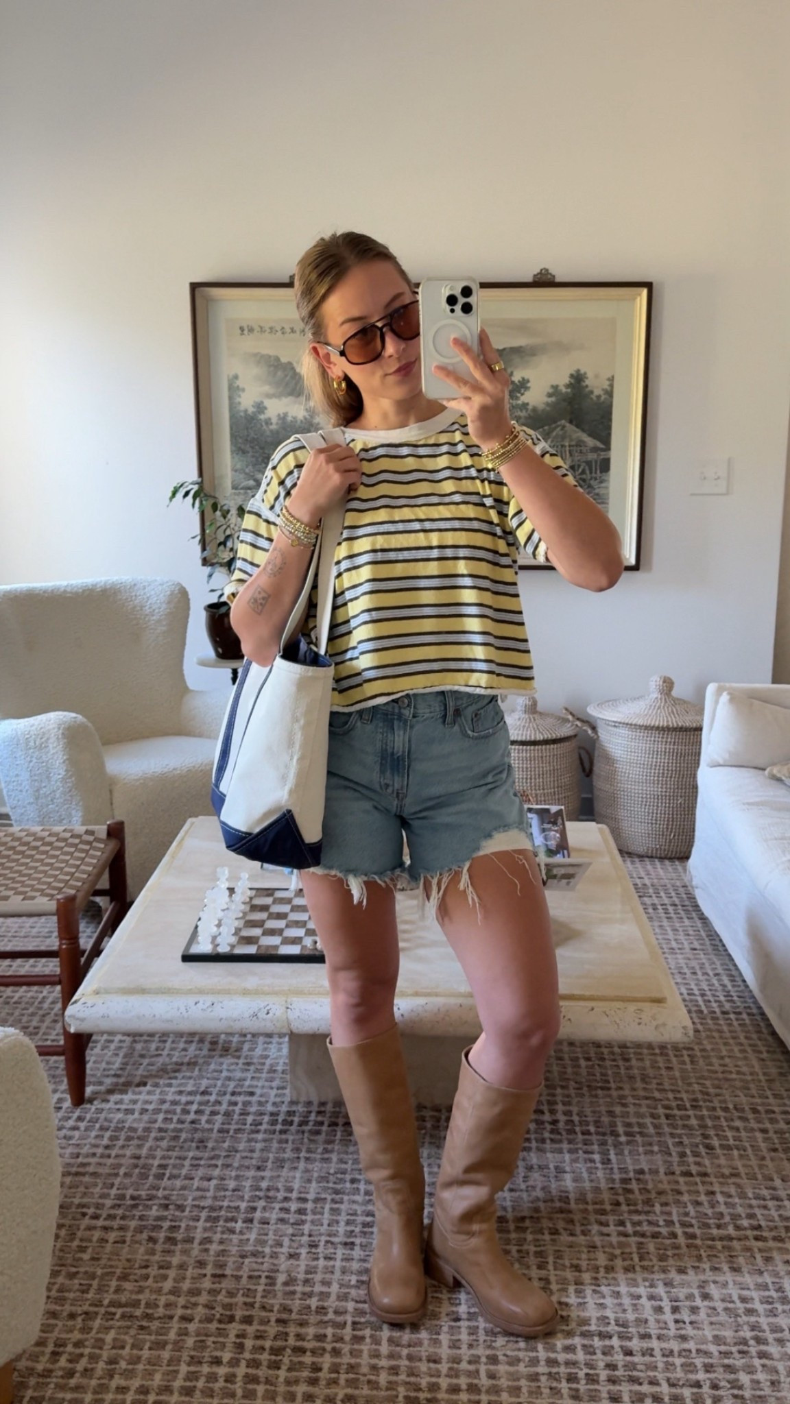 9/13/25 Casual errands OOTD ☀️ Linking my Amazon sunnies, striped tee from Free People, my go-to Abercrombie denim shorts, my classic L.L. Bean Boat & Tote, and my Steve Madden Riggs boots. Cozy, casual, and practical for running around today 🤎✨

#LTKShoeCrush #LTKStyleTip