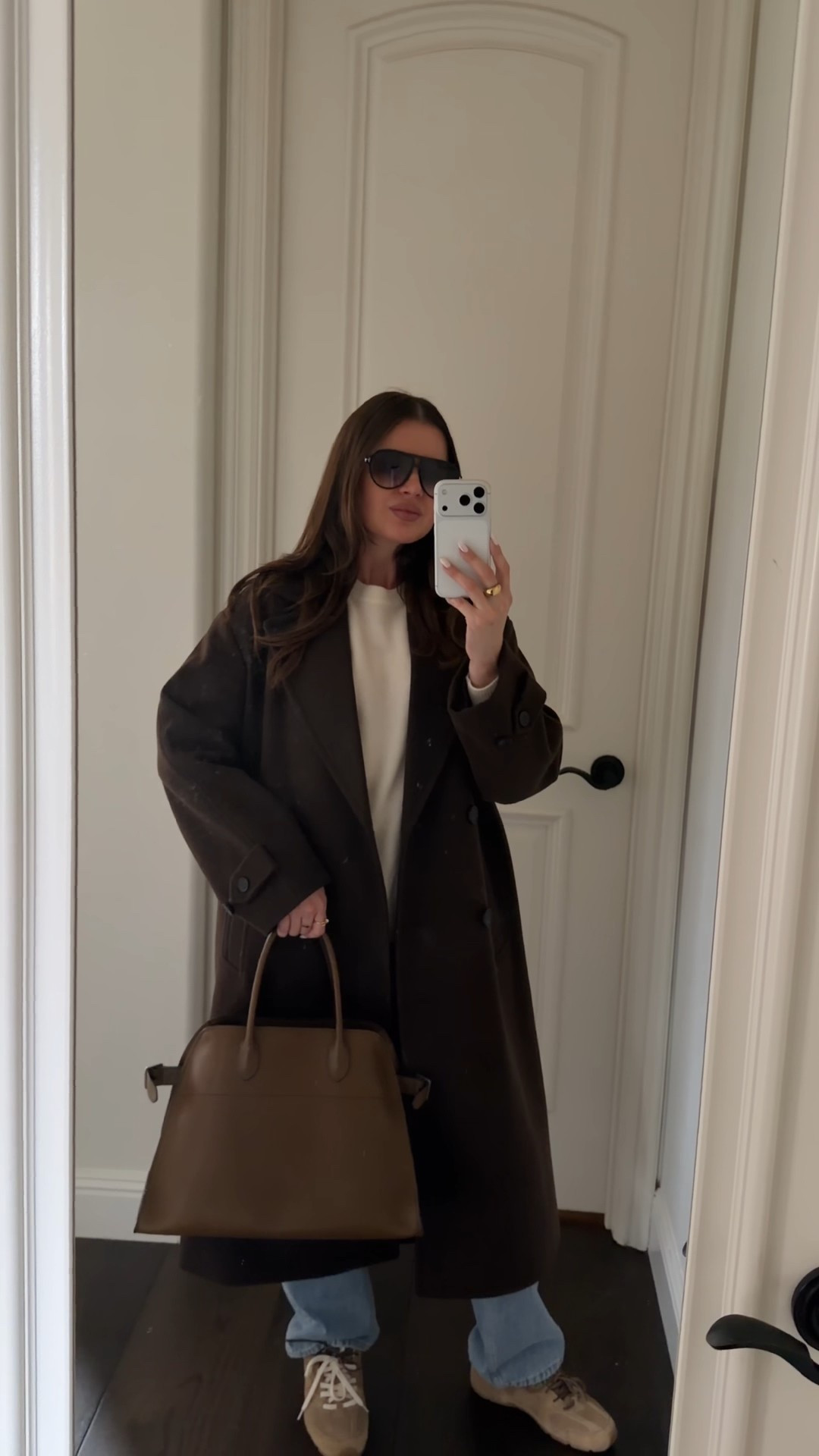 Styling this espresso brown coat with straight leg jeans, cashmere sweater and suede sneakers 
#espresso #brown #darkbrown #chocolatebrown #coat #cashmere #sweater #beige #cream #therow #zara #margaux #suede #sneakers #miumiu #aviators #newbalance 

#LTKootd #LTKSeasonal #LTKFindsUnder100