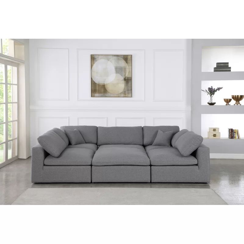 Aguero 119" Wide Reversible Modular with Ottoman | Wayfair Professional