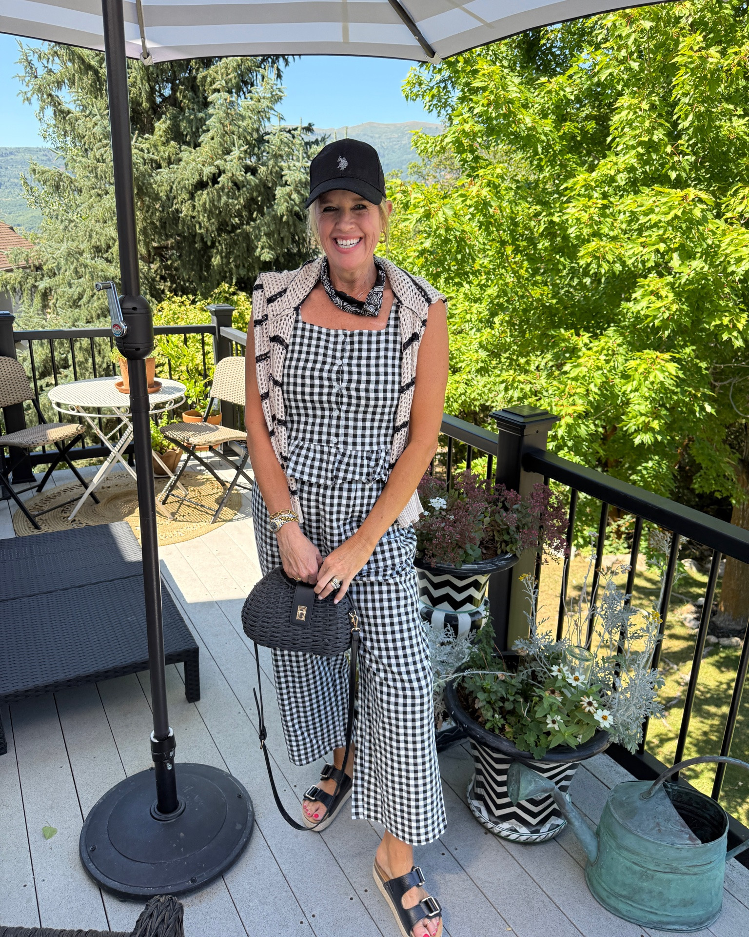 Gingham set 
Style over 50 
Way to wear 

This is yet another gingham set that’s so cute , affordable and comes in several colors 

-Love the ruffle peplum and from botton detail 
- crop wide leg pant, pull on elastic waist with pockets 

Fits tts 

Black bandana scarf around neck 

Black Ralph Lauren baseball cap 

Black straw basket bag (linked similar) 

Black platform 2 buckle sandals by Frankie4 

Crochet sweater in black and cream stripe and perfect weight for summer to fall

#LTKootd #LTKOver40 #LTKSaleAlert