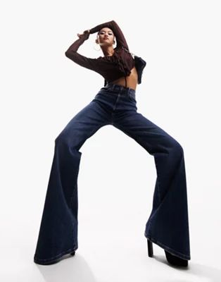 ASOS DESIGN '70s' power stretch flared jeans | ASOS (Global)