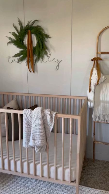 Christmas nursery decor 

baby room. Nursery. Neutral nursery. Christmas decor. Wood crib. Wool rug. Neutral rug. Bookshelf. Acrylic shelves. Rattan. Blanket ladder. Home decor. Baby’s first Christmas 

#LTKhome #LTKbaby #LTKHoliday