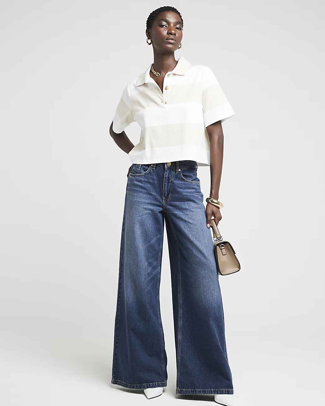 Blue mid rise wide leg elasticated jeans | River Island UK & IE