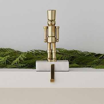 Brass & Marble Nutcracker Stocking Holder | West Elm (US)