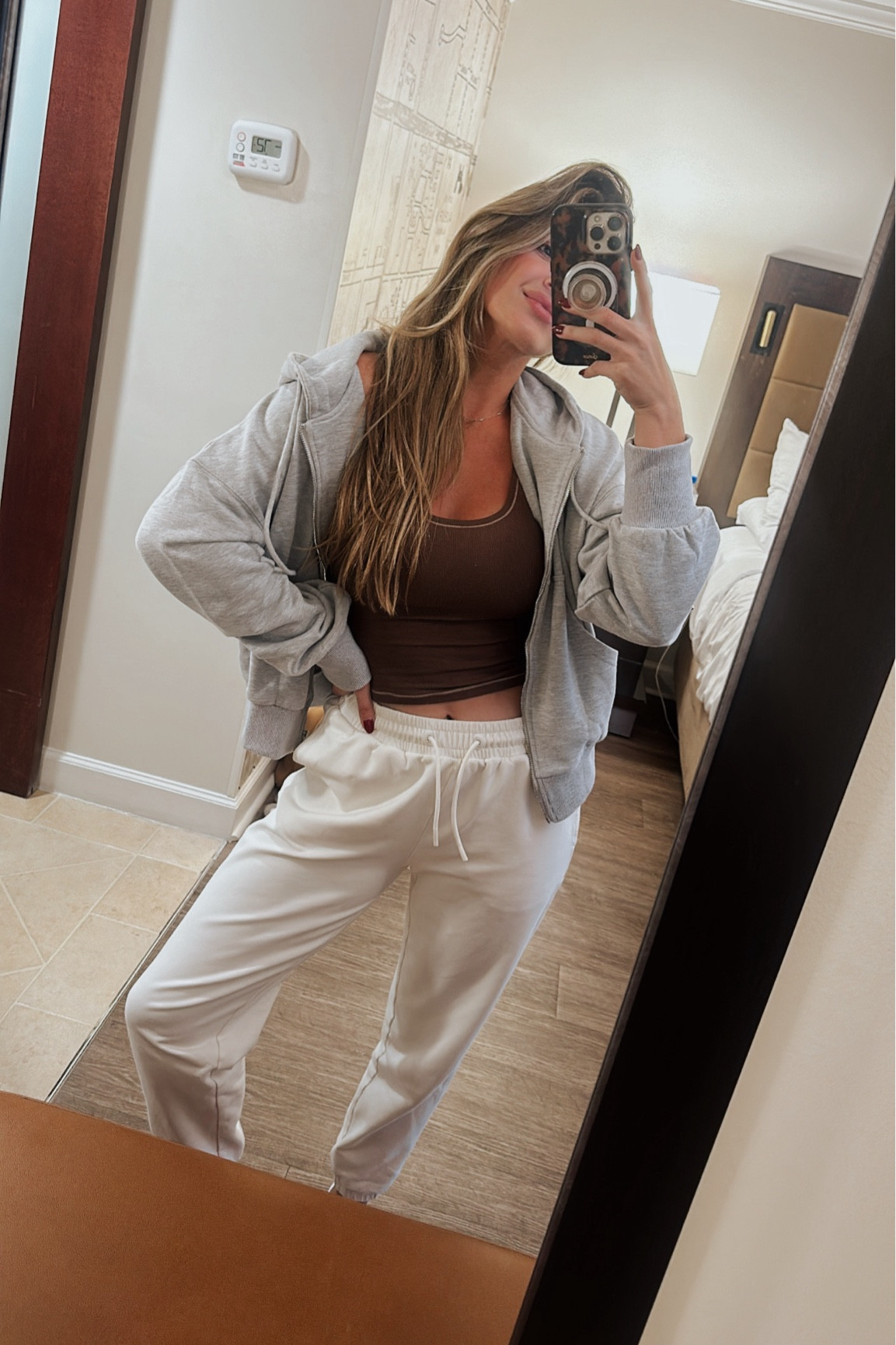 
 Amazon travel fit  ✈️🏃‍♀️👟  Wearing size Medium in the hoodie and size Small in the tank.  

Sweatpants are old from RicherPoorer (no longer available) 

#LTKActive #LTKFindsUnder50 #LTKTravel