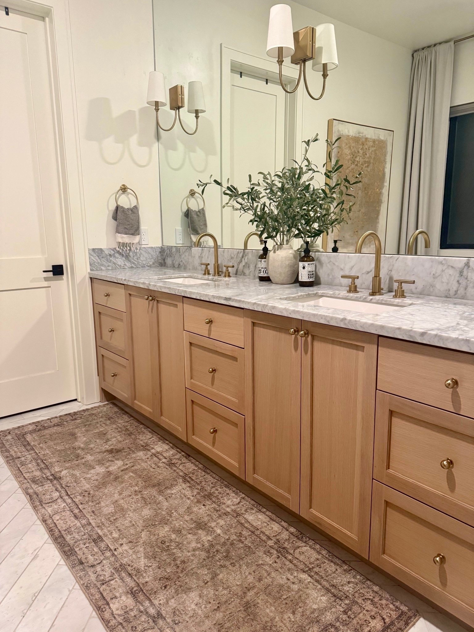 Love the new rug in our primary bathroom. My sconces are also on sale right now, and so is the hardware. 
@Wayfair 
@Target 
@Amazon

#LTKSaleAlert #LTKHome #LTKU