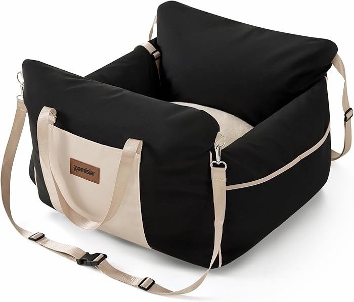 I got this dog car seat for snickers. I think it will be perfect when we take him in the car! It’s under $40 