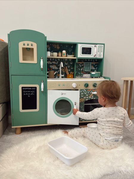 Playroom play kitchen is finally back in stock!! Wooden play kitchen   With mini sink, oven, microwave, accessories, and more!

#LTKhome #LTKbaby