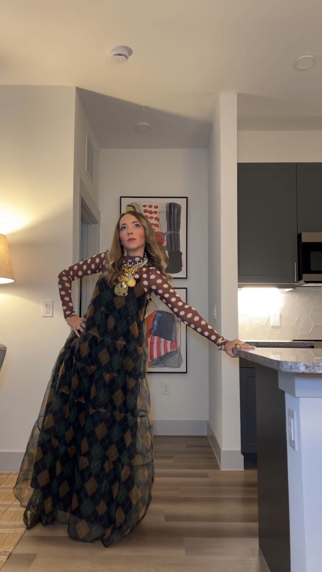 I loved mixing patterns and today’s work fit did just that!!! AFRM Polka dot sheer long sleeve top paired with the sugar lips argyle organza dress!!! Fun combo paired with my go to necklaces and ring  stack !!!! Who says workwear can’t be fun?!

#LTKootd #LTKU #LTKWorkwear