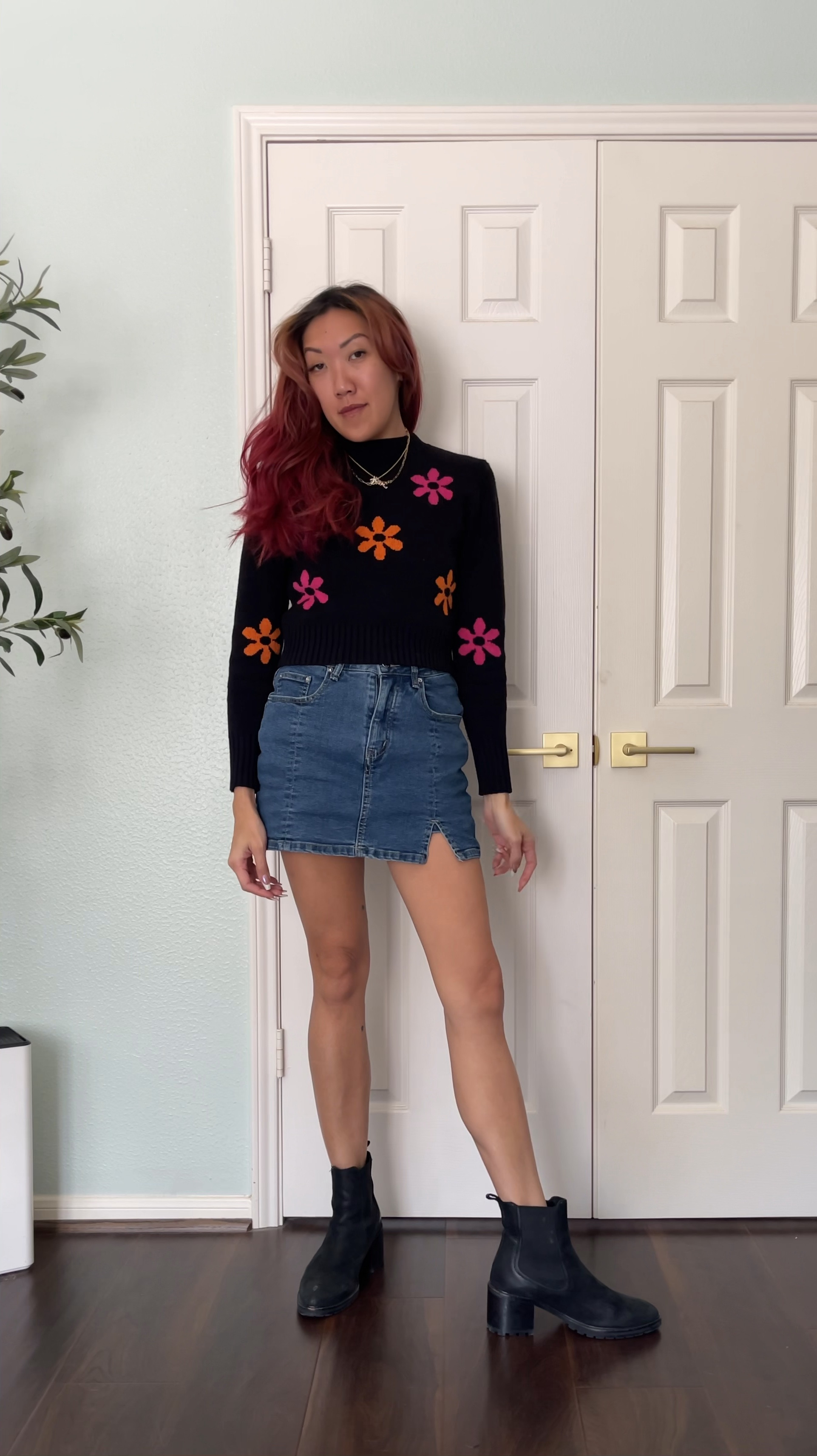 Black floral print cropped long sleeve sweater top with retro pink and orange flower power print, denim skort skirt, black nubuck suede Chelsea boots, ankle boot. Y2K fashion 

#LTKVideo #LTKFindsUnder50