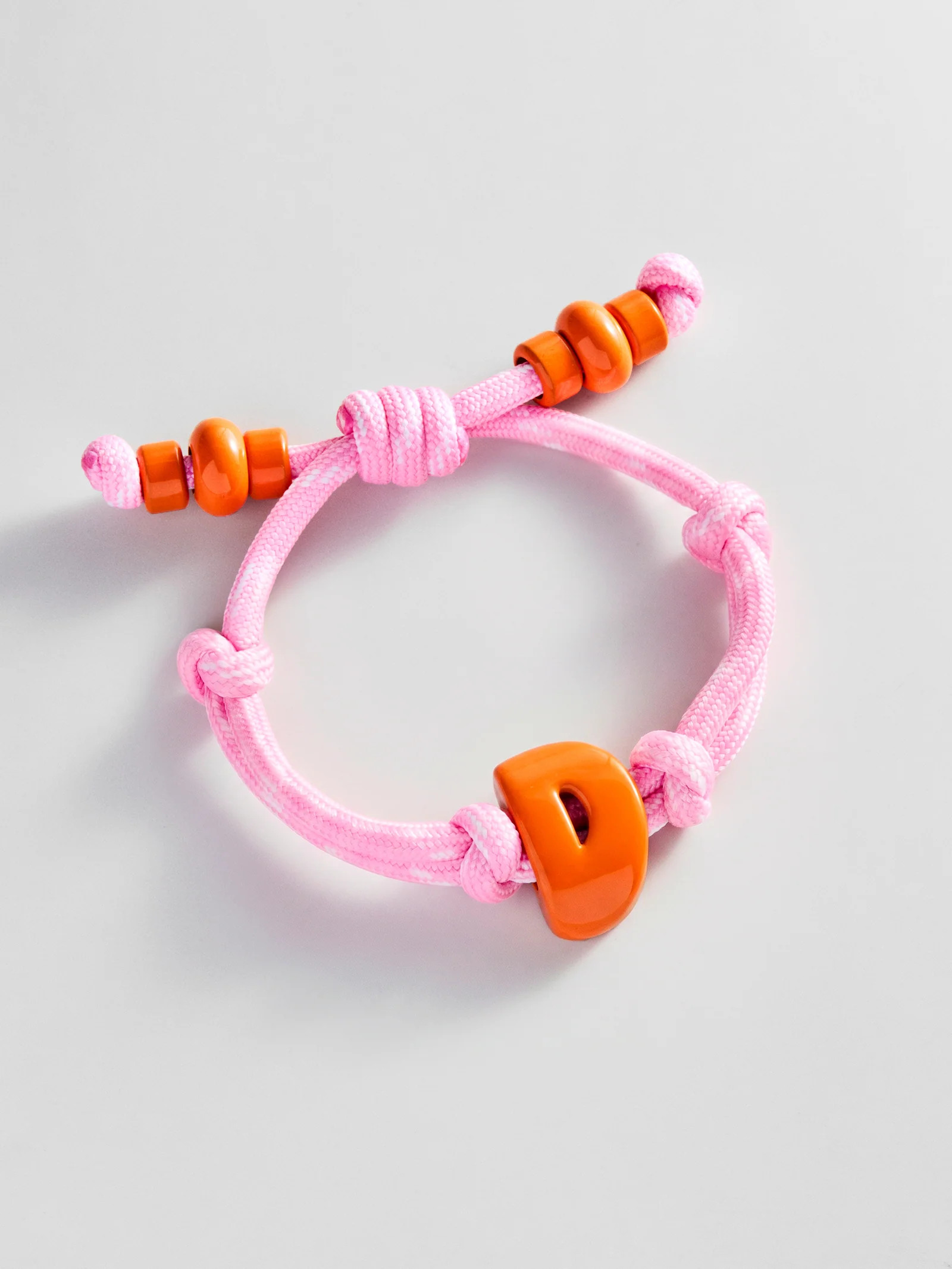 Knotty Enamel Initial Custom Bracelet - Pink/Orange Single Letter | BaubleBar