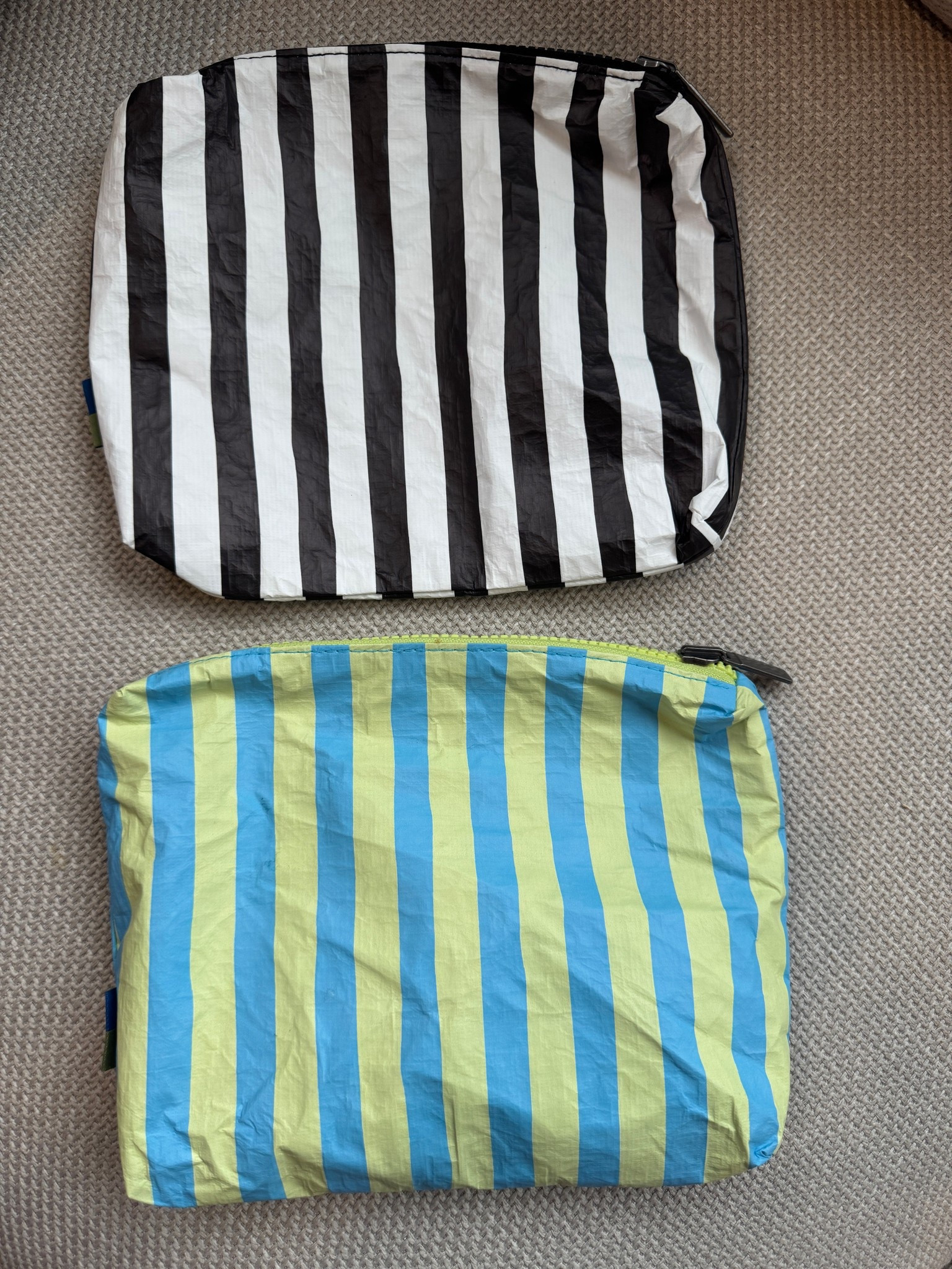 Snagged these $5 pouches at Target and I’m obsessed 🩷 Perfect for travel, diaper bag, or tossing in your purse. Water-resistant + super cute = yes please 👏🏼 come in many different colors!

#LTKItBag #LTKSummerEdit #LTKGiftGuide