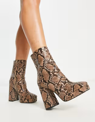 ASOS DESIGN Eden high-heeled platform boots in snake | ASOS (Global)