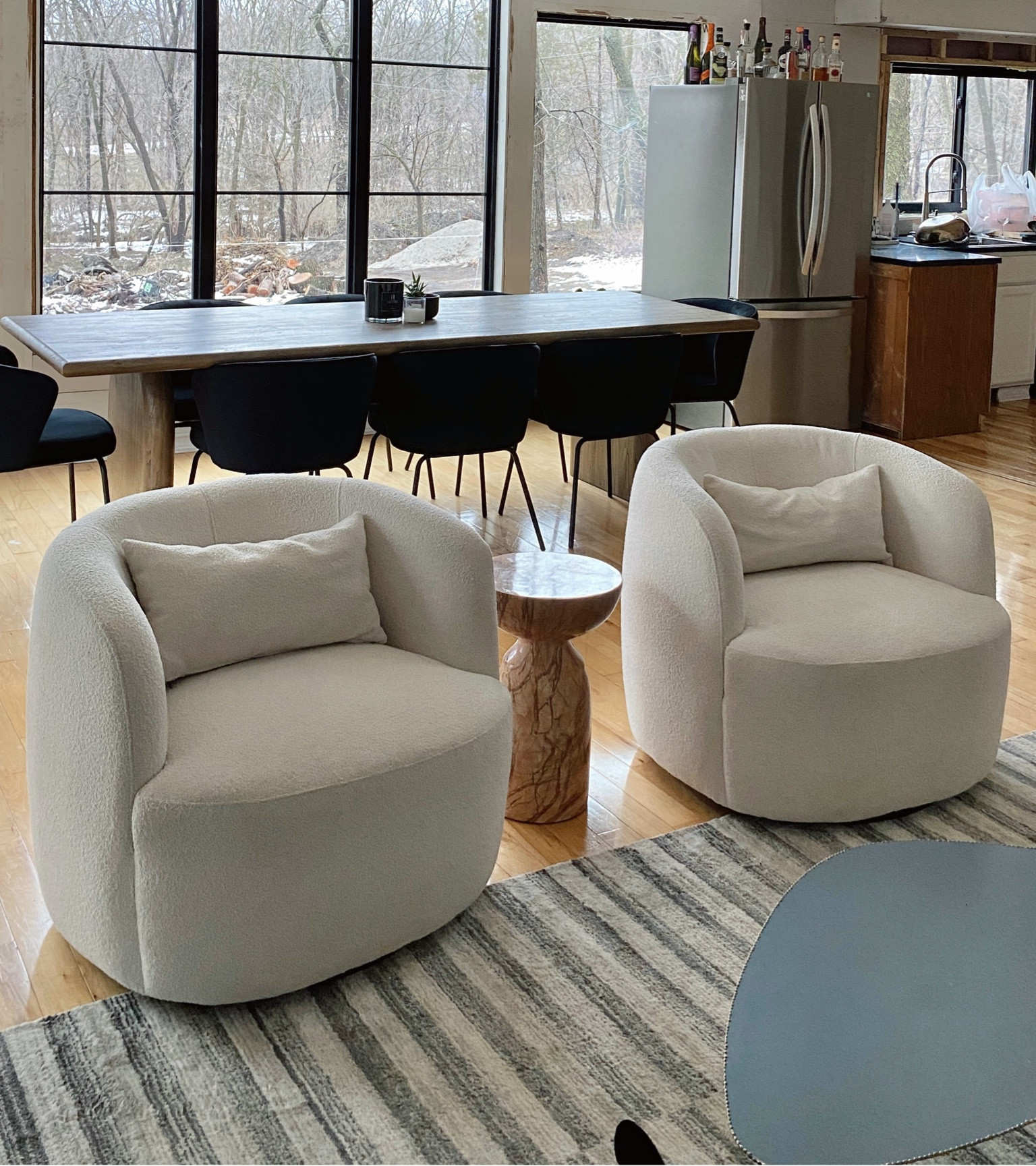 My popular boucle barrel swivel chairs are on sale at Wayfair! Great size, very comfortable and comes with a lumbar pillow. We love them! These are a great stylish and modern addition in a set of 2!

#LTKSaleAlert #LTKHome