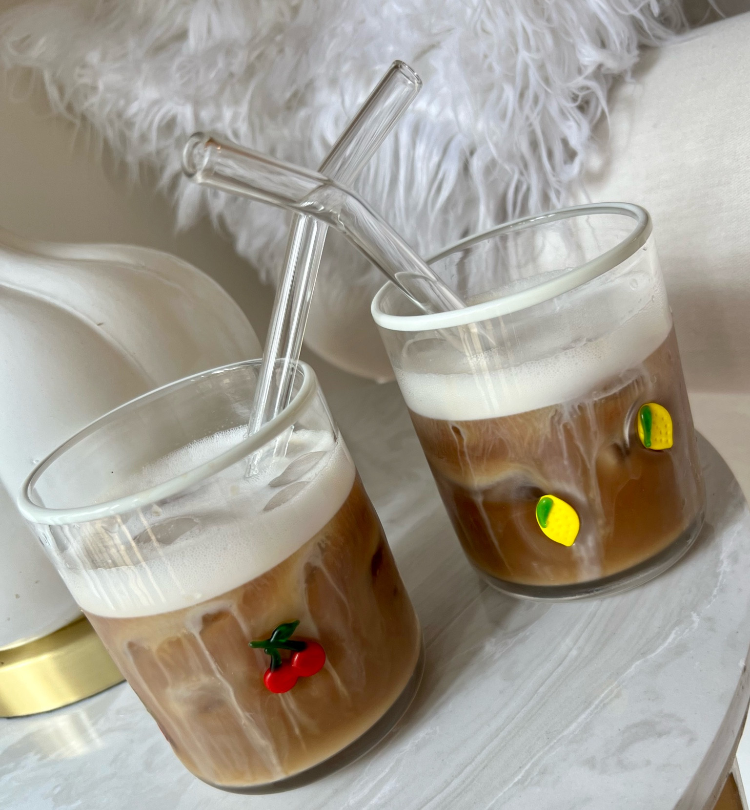 The iconic Anthro juice glasses live up to the hype! It’s true what they say, the ice coffee just tastes better out of them 🍋🍒 #anthropolgy #coffee #home 

#LTKHome #LTKFindsUnder100