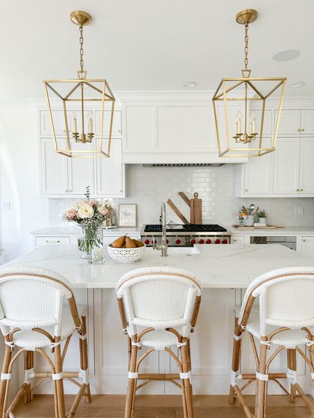 White kitchen, pendants, kitchen island, bistro chairs, coastal kitchen, Target vase, glass vase, fruit bowl

#LTKhome #LTKstyletip #LTKFind