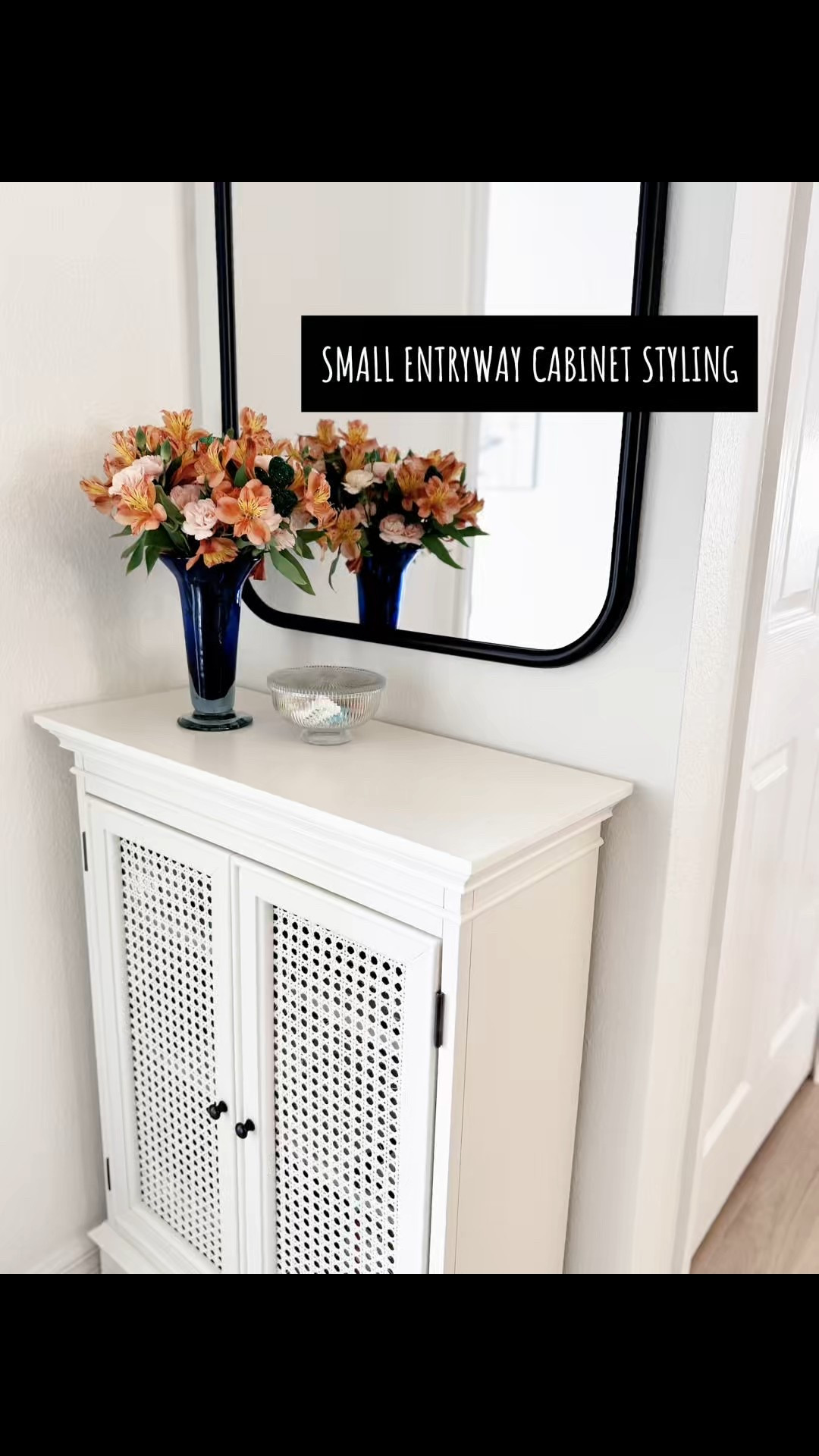 This beautiful Ballard Designs cabinet was the perfect size for this small entryway. It adds storage with two shelves and gives you classic charm. The mirror above makes the space feel larger to guests as they walk in the door. The top gives you just enough space to add a key drop and seasonal decor.  #entryway #cabinets #storage #foyer #canefurniture 

#LTKHome