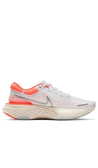 ZoomX Invincible Run FK Sneaker in White & Mango | Revolve Clothing (Global)