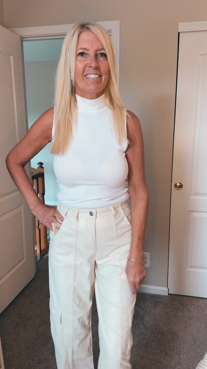 ONLY $26 faux cargo pants in high-rise and so flattering. 

Wear with this sleeveless mock turtleneck with a trendy denim jacket for fall. 

Flats or sneakers for a finished outfit. 

I’m wearing a size small 4-6 in the pants and a small in the top. They both fit TTS. 

#LTKOver40 #LTKFindsUnder50 #LTKFallSale