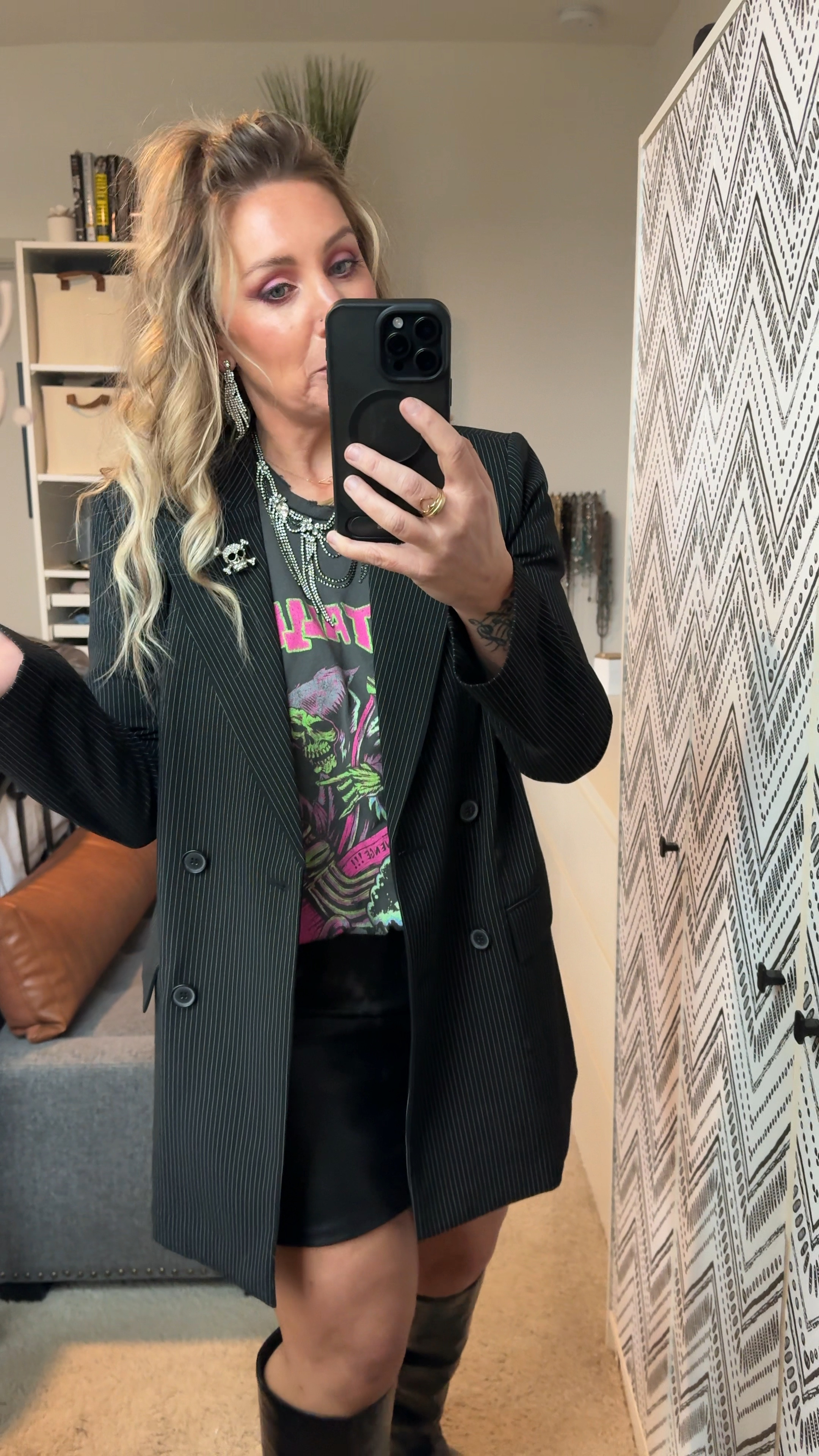Snagged some band tees this past week and sharing some ways to style for upcoming concerts or events! This Metallica one is a one size fits all. I will probably wear as a dress in the summer but for now, paired with a skirt and oversized blazer! It’s already distressed! Love it! 
#concertstyle #bandteestyle #styletip

#LTKover40 #LTKstyletip #LTKfindsunder50