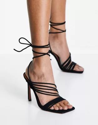 ASOS DESIGN Nest strappy tie leg heeled sandals in black | ASOS (Global)