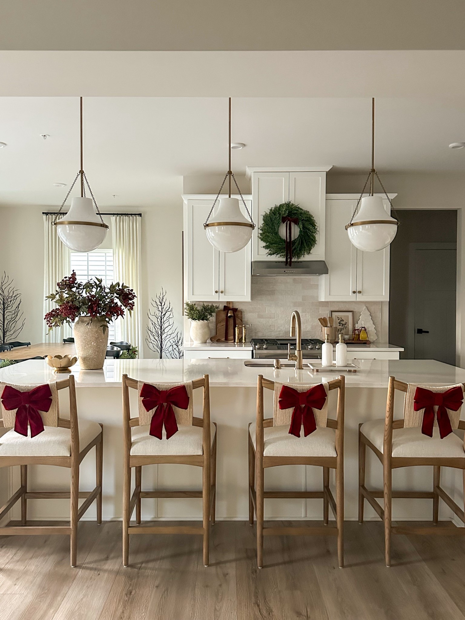 Holiday kitchen views 
#kitchendecor #whitekitchen #holidaydecor #christmasdecor #whitekitchen #brasshardware #pendantlights #counterstools #wayfair #amazon #mcgeeandco #luluandgeorgia #lightopia #target #potterybarn

#LTKHoliday #LTKSeasonal #LTKHome