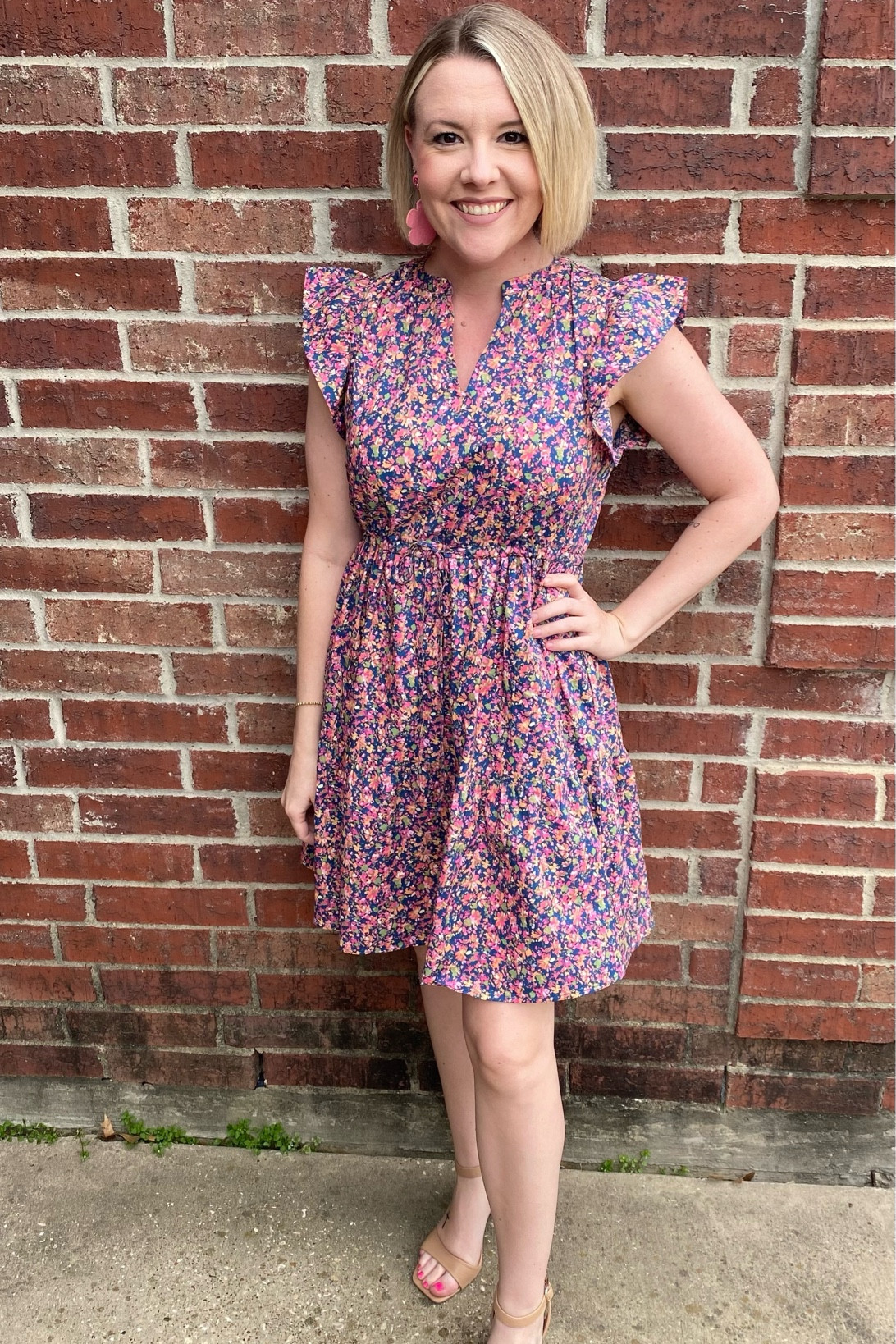My sister wearing the prettiest floral dress by time and Tru at Walmart!! Walmart new arrivals! Walmart spring finds! Time and Tru dress! Floral dress! Walmart dress!! 