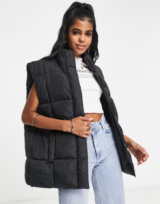 ASOS DESIGN puffer vest in black | ASOS (Global)