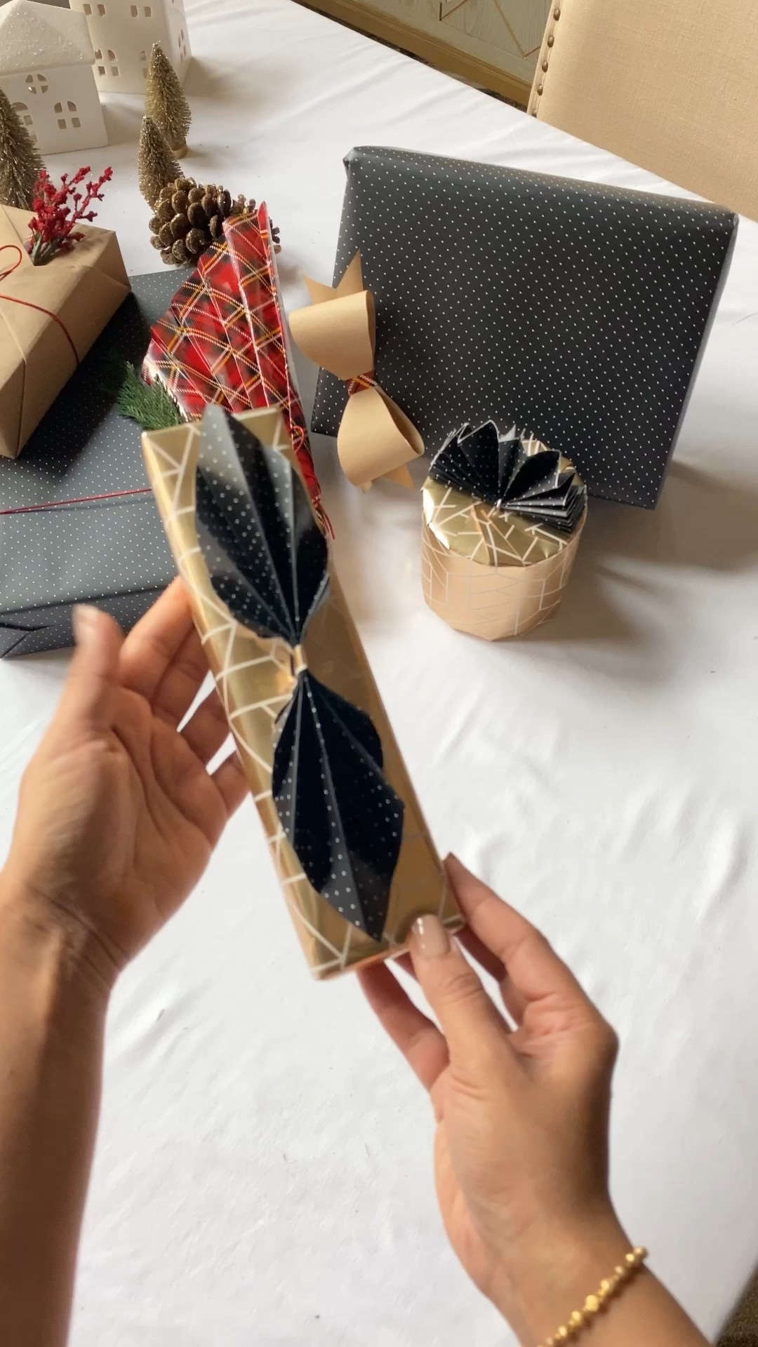 My favorite way to wrap presents. I love using extra pieces of wrapping paper to add 3D designs!

#LTKSeasonal #LTKGiftGuide #LTKHoliday