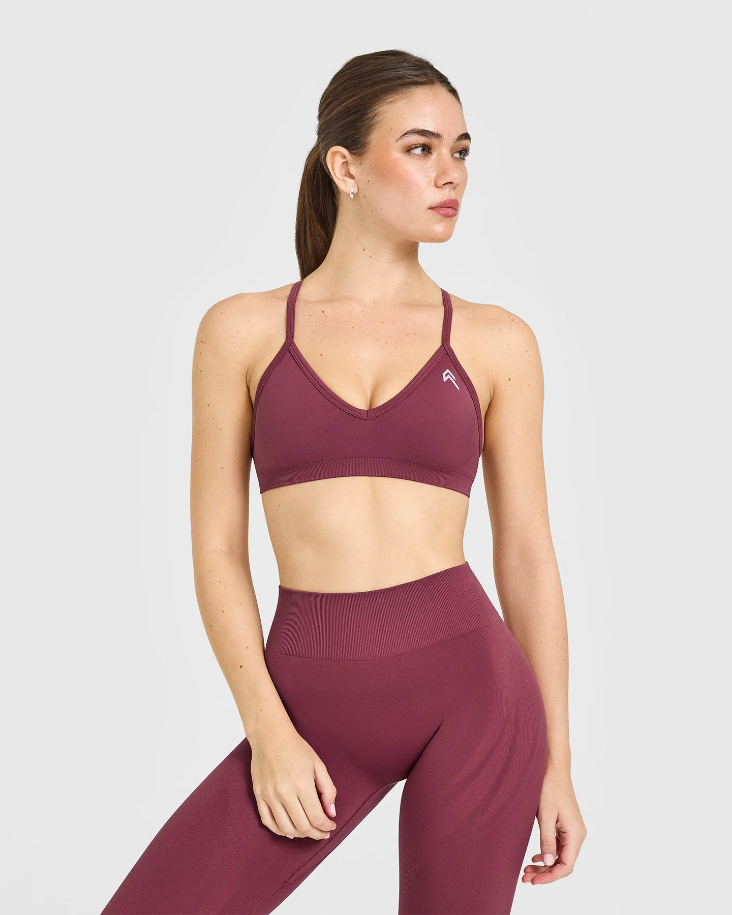 EnhanceLift\u2122 Seamless Strappy Sports Bra with White Logo | Burnt Maroon | Oner Active (UK / US)