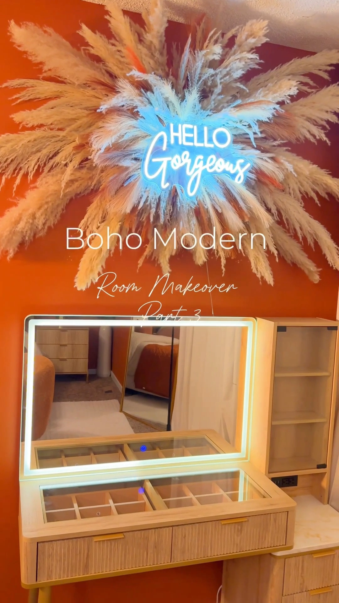 Part 3 of the boho modern room! Beauty Corner 💄🧡🤗 

I just have to add the same wallpaper to the window wall, vanity chair, trim on my tv, and new curtains then it’s done 😅 I keep it very symmetrical when I do walls, but wanted to finally try the pampas grass accent with sign, which matched the boho modern theme perfectly! 

✨all pampas grass and diy cage to make the bloom are shared on the lists as well! Plus ones from @hobbylobby 

✨The  hello gorgeous sign I hung here,  but have to order longer screws to mount more flush! 

✨I added this gorgeous makeup vanity to my Amazon list. It’s sooo gorgeous! 

.
.
.
.
.
#home #bohomodern #amazonhome #bedroomideas #bedroommakeover #pampasarrangement #makeupvanity #pampasgrass 

#LTKBeauty #LTKHome #LTKStyleTip
