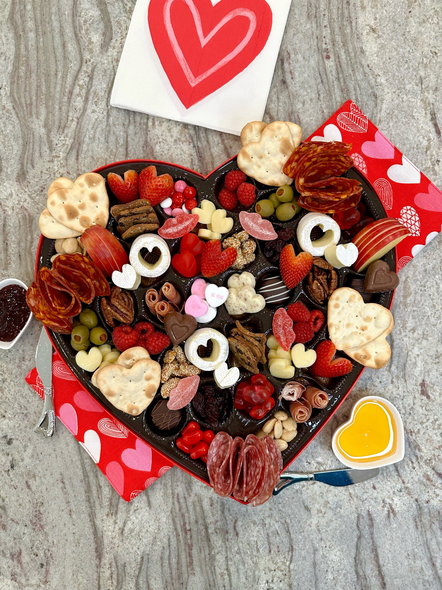 Don’t throw away that cute box your Valentine’s Day chocolates came in! Use it to make an extra special Cheese and Charcuterie Heart Box to snack on with your love.

#LTKSeasonal