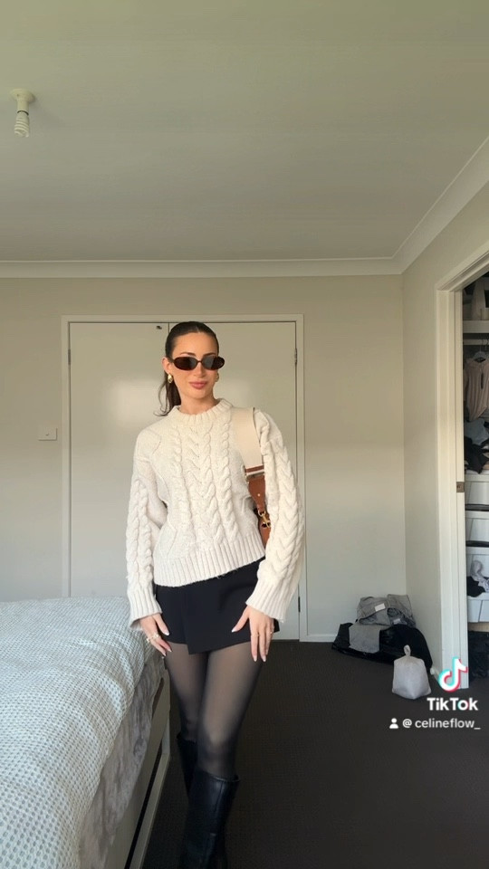 Fall inspired outfit! Black skort paired with a cable knit sweater from H&M and knee high black boots. Size AU S in sweater and 7 in boots. 

#LTKspring #FashionMonth #LTKaustralia