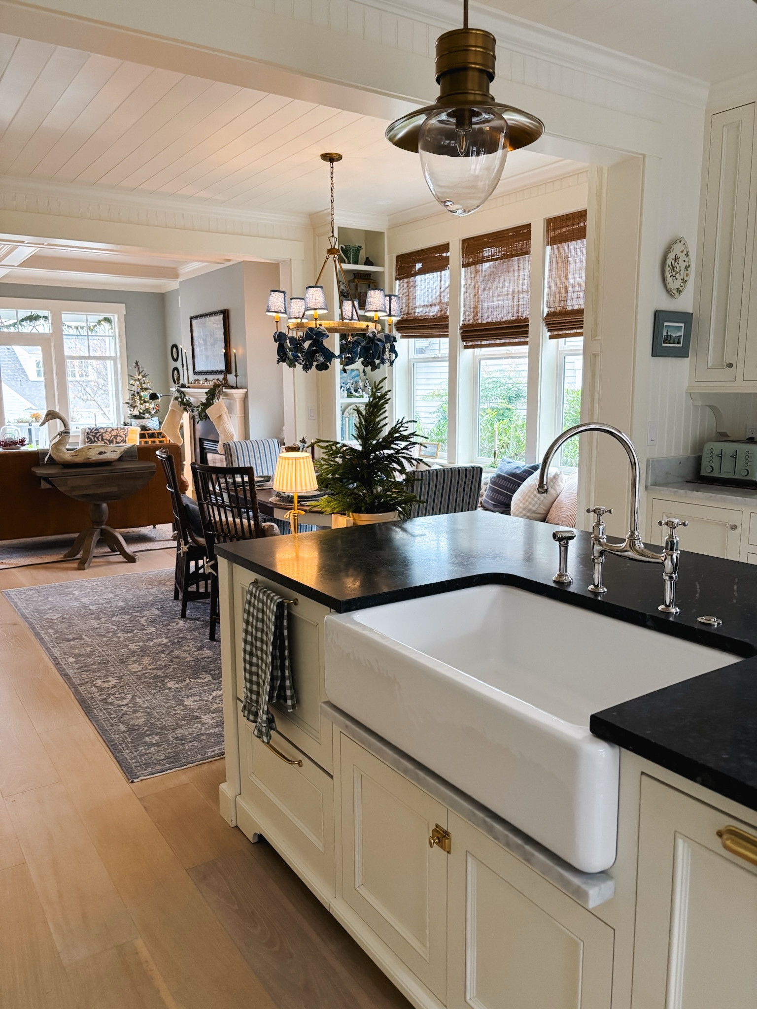 Kitchen and dining room sources - sink similar pendants bamboo shades ruffled gingham tea towel, toaster chandelier rug cordless rechargeable lamp, kitchen hardware and more #LTKHoliday

#LTKHome #LTKSeasonal