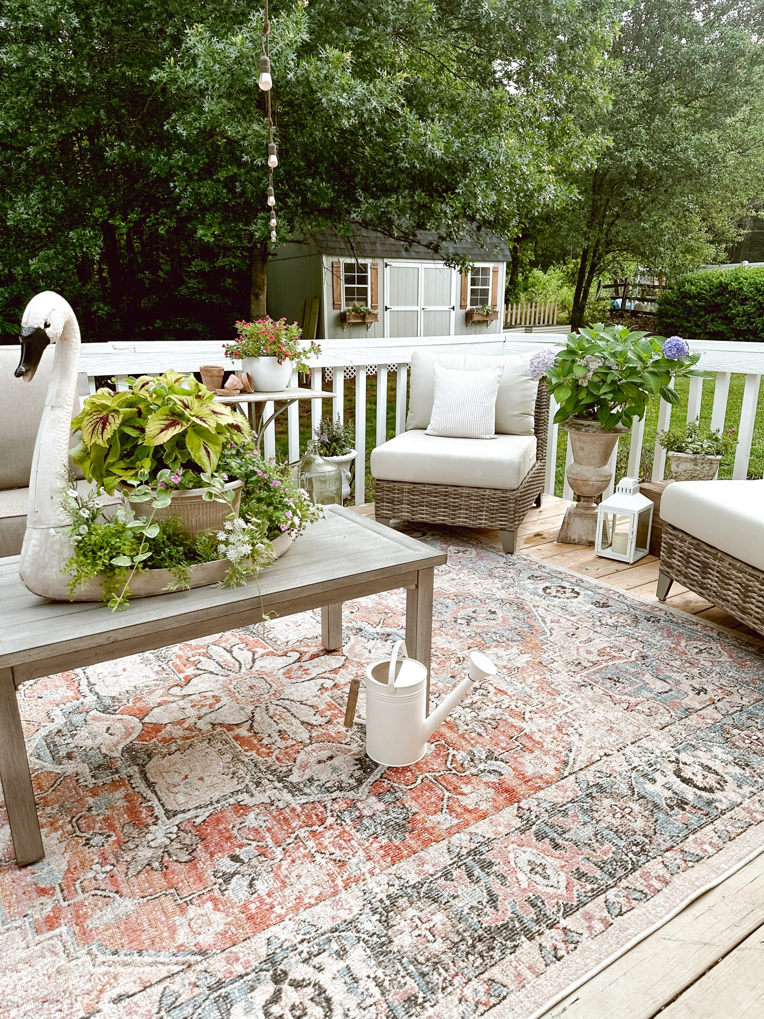 Outdoor farmhouse porch with patio furniture and layers 

#LTKhome #LTKSeasonal #LTKFind