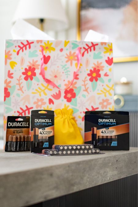 #TargetPartner Back with another friendly reminder to not forget the small yet important details when gift giving! Batteries and pretty wrapping, duh! Here are 2 creative ways to add @duracell batteries to your gift!
1. Place them in a coordinating cloth bag and tie them onto your gift bag
2. Place them into a miniature pinata and tape to the top of your gift box 
Buying better performing batteries like Duracell make for a better gift giving season! All of these Duracell batteries and wrapping must haves can be found @Target! #EngineeredforMore #Target #Ad 