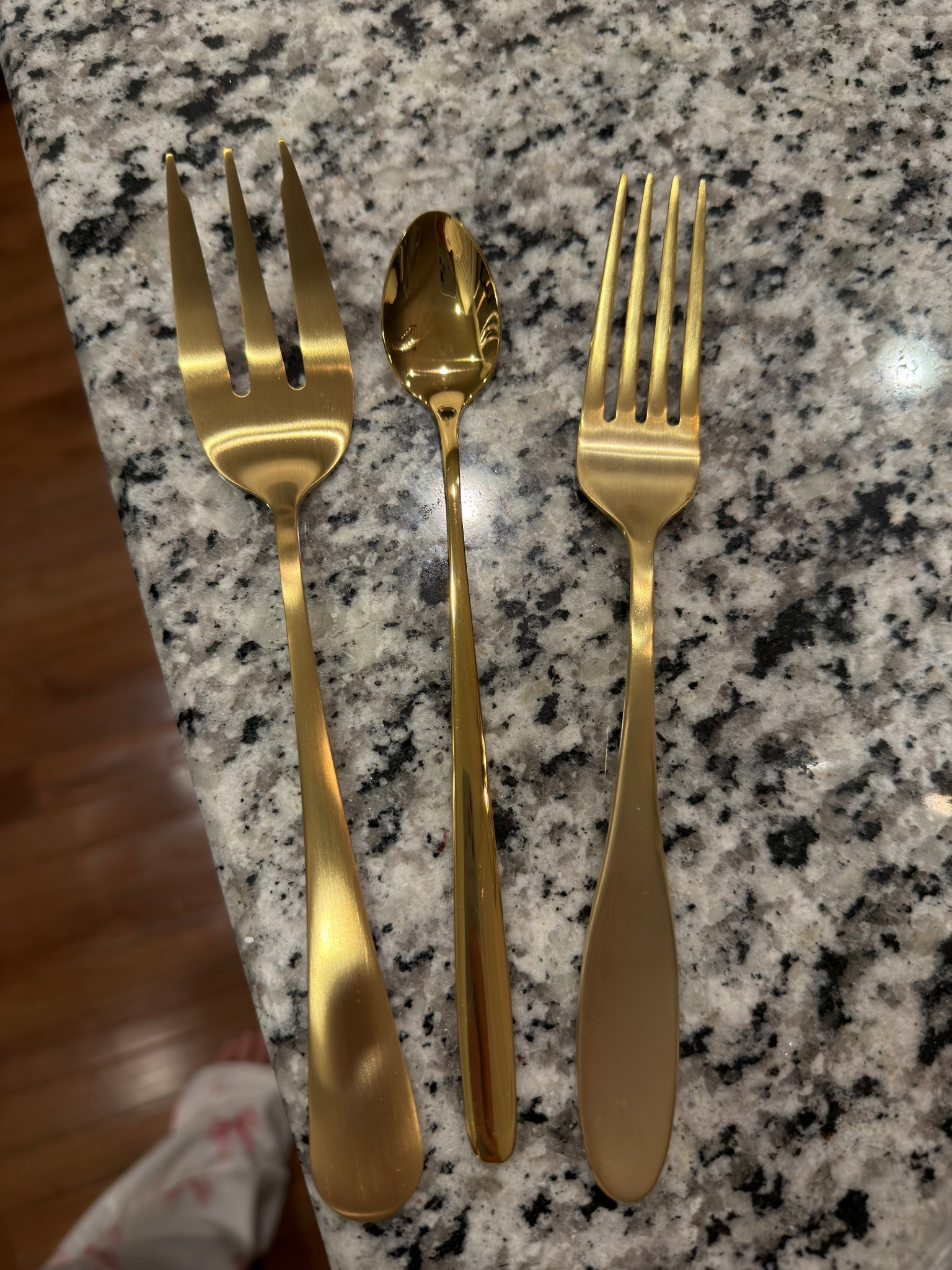Gold serving utensils and ice tea spoons linked! The regular utensil set (fork pictured) is old, but I linked similar!

#LTKHome #LTKHoliday #LTKmomlife