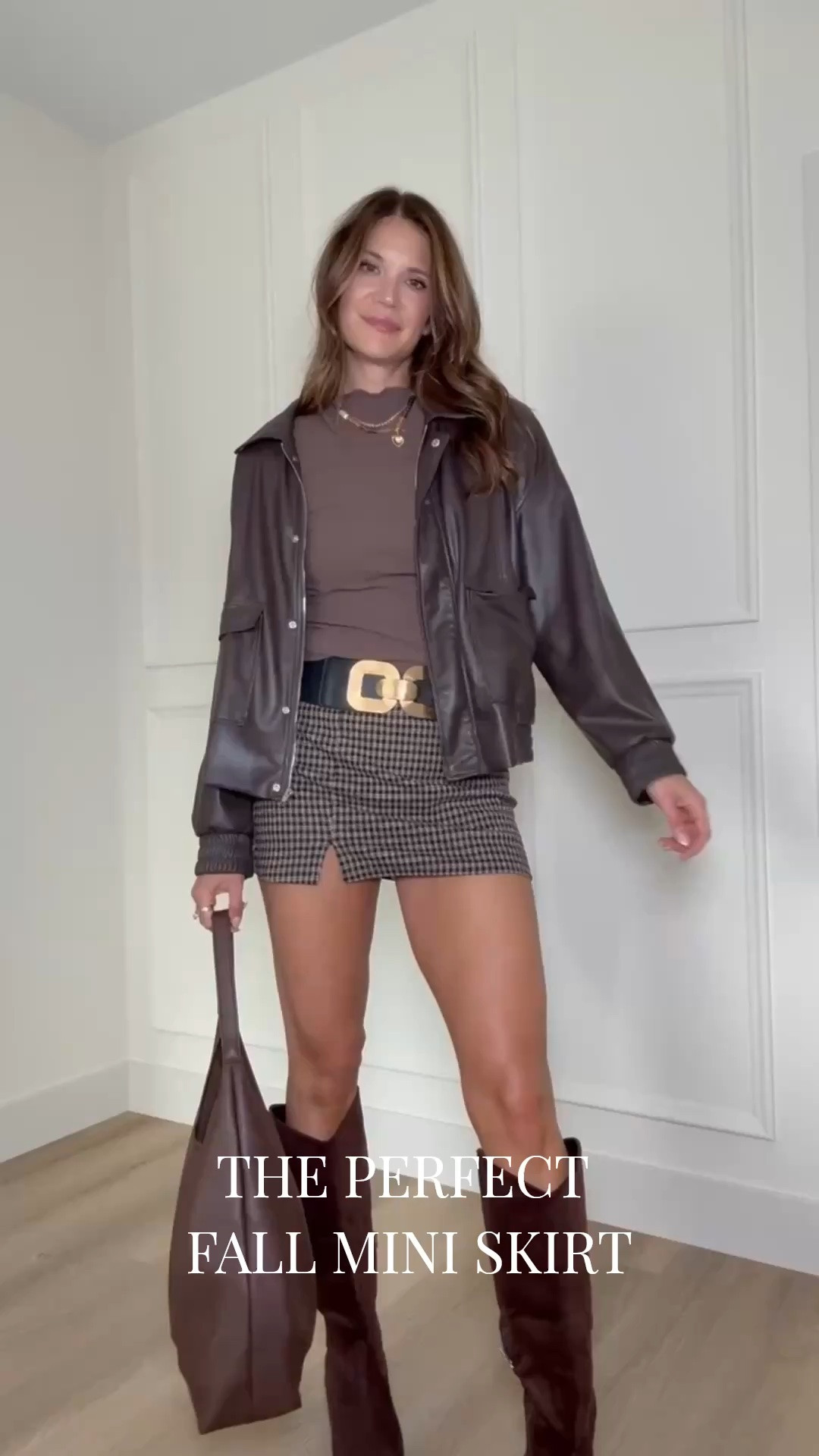 This outfit is making a strong case for chocolate brown this fall! The faux leather jacket with the plaid mini skirt, statement belt, and tall boots gives the whole look a little edge while still feeling polished. I love mixing these textures for a fall date night or weekend out!

Faux leather jacket, Plaid mini skirt, Chocolate brown outfit, Fall outfit ideas, Tall girl fashion, Tall friendly clothing, Knee high boots, Brown leather jacket, Fall date night outfit, Statement belt, Elevated fall style, StangandCo