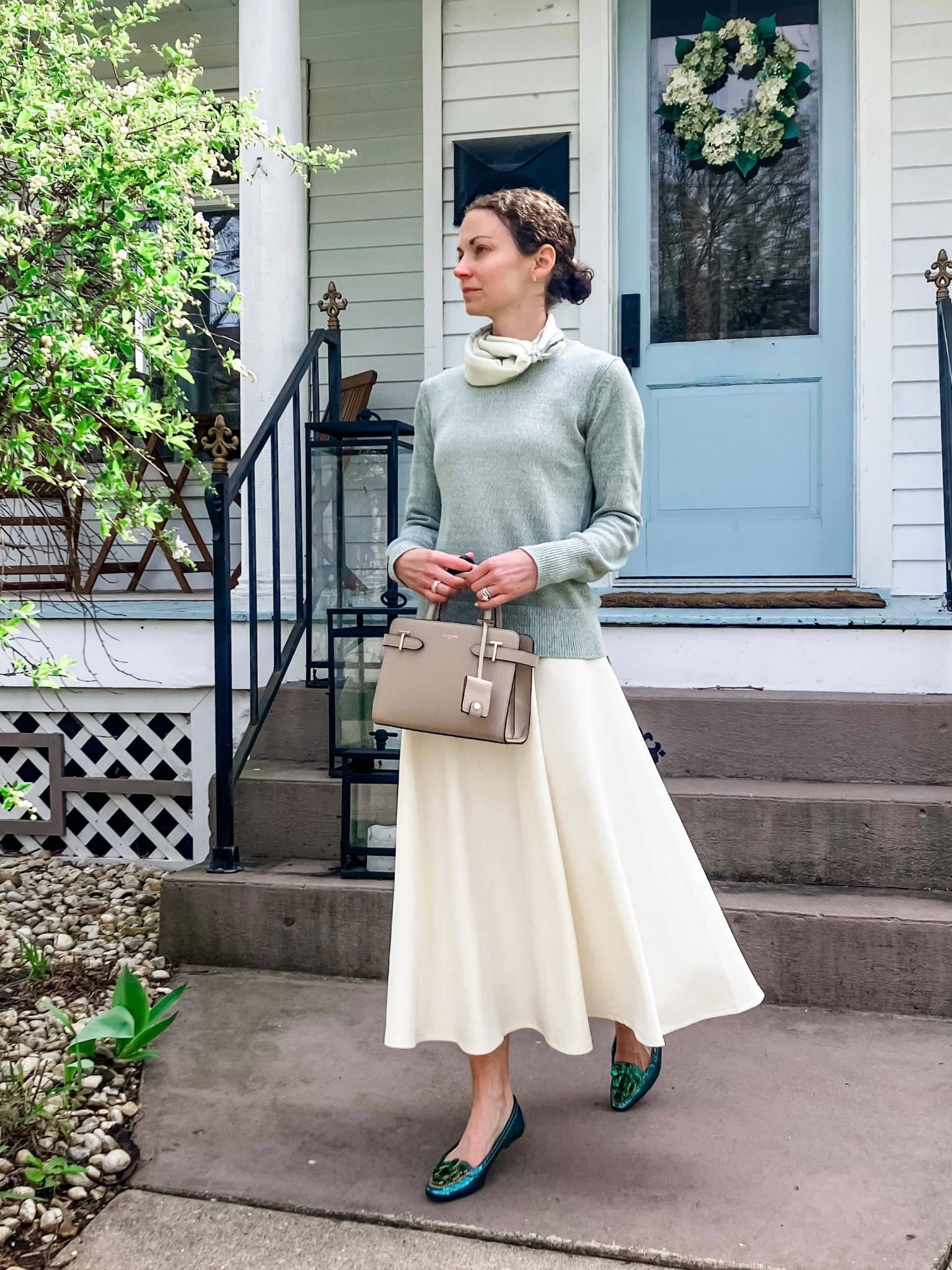 Spring church outfit!
Silk scarf is vintage, linking similar. 
Mint green sweater is old from Madewell, linking similar. 
Cream midi skirt from Chicwish. 
Leather handbag from Le Tanneur. 
Green jewel flats are vintage Prada, linking similar. 
Diamond stud earrings from Amazon. 
Eternity band ring from Amazon. 
Church outfit. Petite outfit. Spring outfit. Modest outfit. 

#LTKOver40 #LTKmomlife #LTKdayinmylife