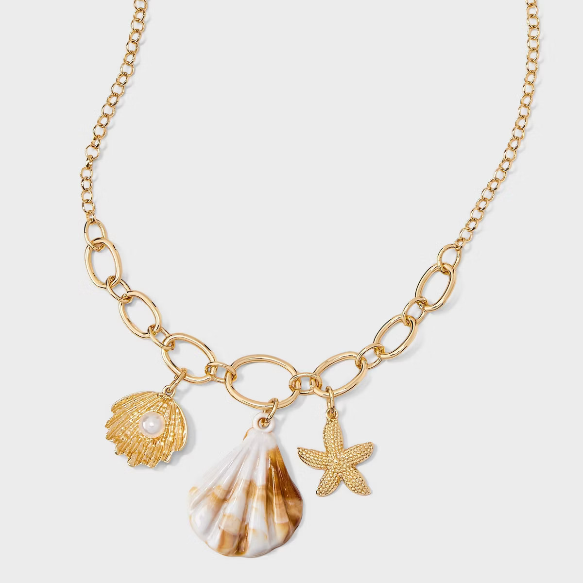 Shell And Starfish Drop Long Necklace - A New Day™ Neutral/Gold | Target