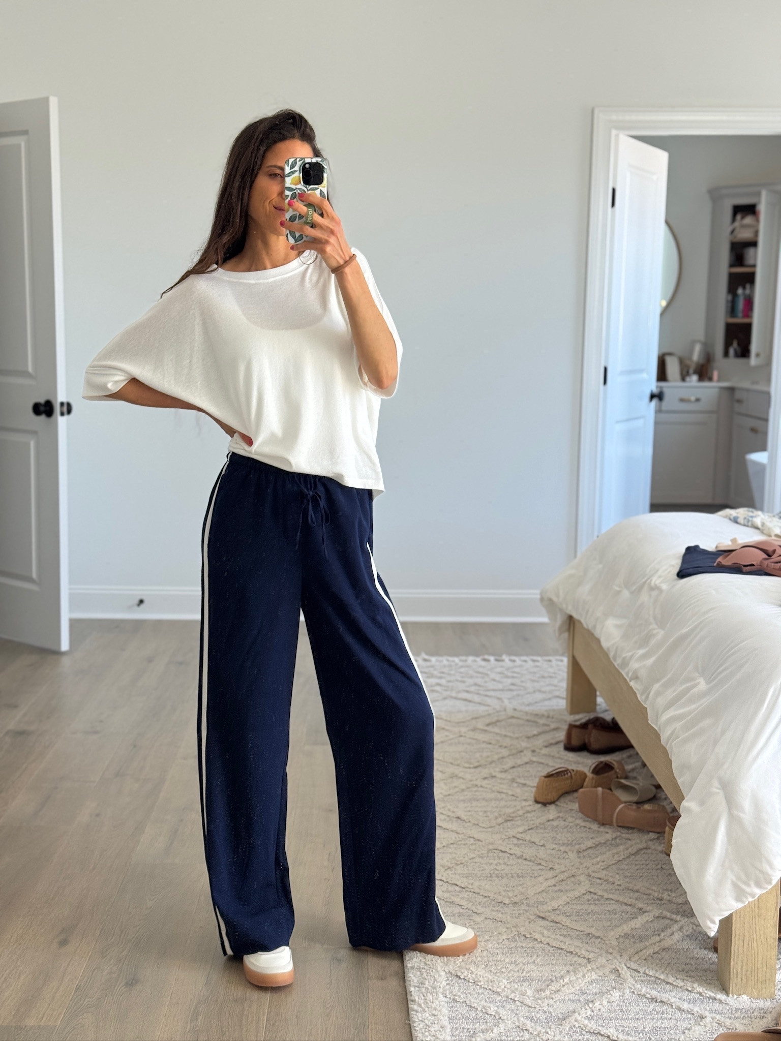 This is one of those outfits that just works every time
Comfortable, effortless, and perfect for everyday wear
athleisure outfit, wide leg sweatpants, white tank, casual spring outfit, neutral style, comfy outfit

#LTKmomlife #LTKootd #LTKSeasonal