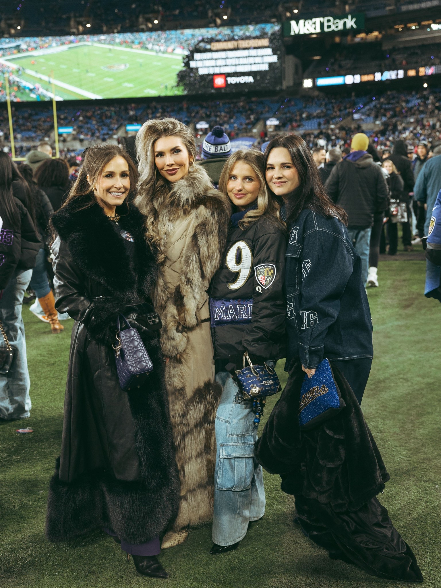 Ladies under the lights ✨🐦‍⬛💜 My vintage fur is from FCCE, I’ve linked some similar options but also love looking on eBay and in local thrift shops for vintage furs. The wait cinching detail on this coat stopped me in my tracks, it helps it not feel too bulky. I LOVE a statement coat! My snakeskin booties are Yeezy Season 8, and I linked some similar options. My clear purse is Louis Vuitton, and my custom KVN signature diamond ring is by Happy Jewelers. 

#LTKootd #LTKgrwm