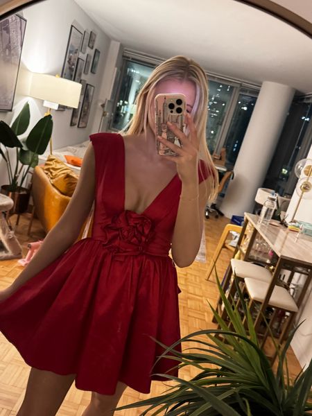 red dress with a bow and rose flower on it perfect for valentine’s day 
