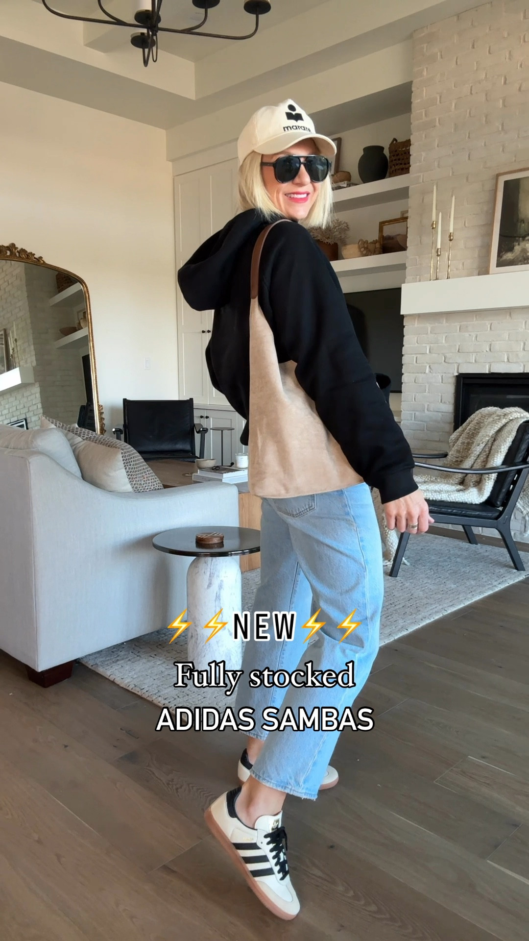 Casual, sporty outfit idea.🖤👖👟Amazon hoodie & suede bag, the perfect “sneakers jeans” and some of my favorite accessories. 
Do not sleep on these NEW adidas samba sneakers. 🚨They will sell out! Love the neutral, but a little edgy look of these. 
Sizing~
Sneakers: I sized down⬇️ a half a size
Hoodie : I sized down to a small and it’s the perfect oversized fit
Jeans : fit true to size— they’re a loose style, wearing a 27
Tank : fits tts, wearing a medium

#LTKOver40 #LTKShoeCrush #LTKWatchNow