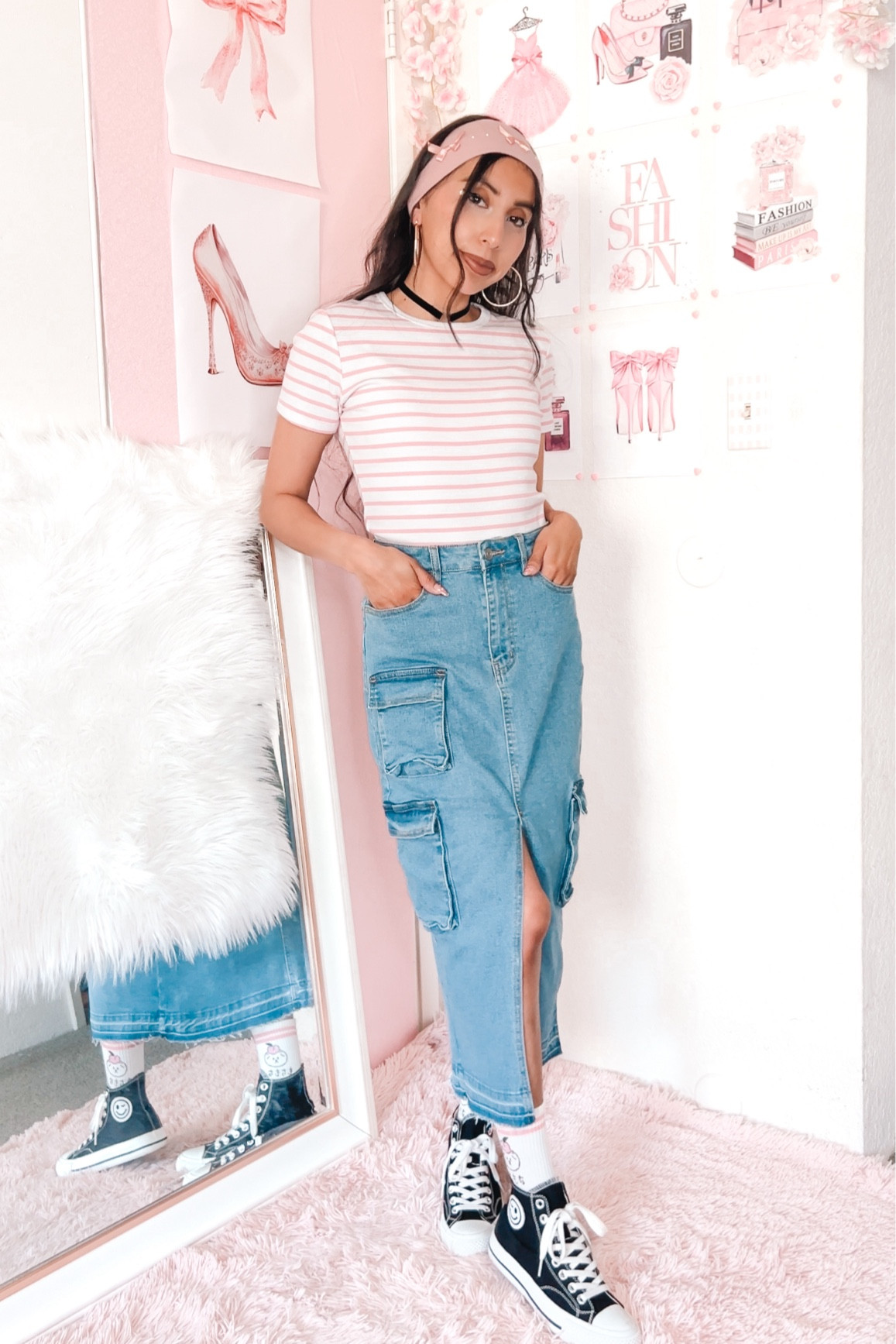 Pink and white striped rib knit tee, cargo denim skirt, white socks, black converse style high top shoes,  black choker, and 90’s hairstyle. #90sfashion #90sstyle