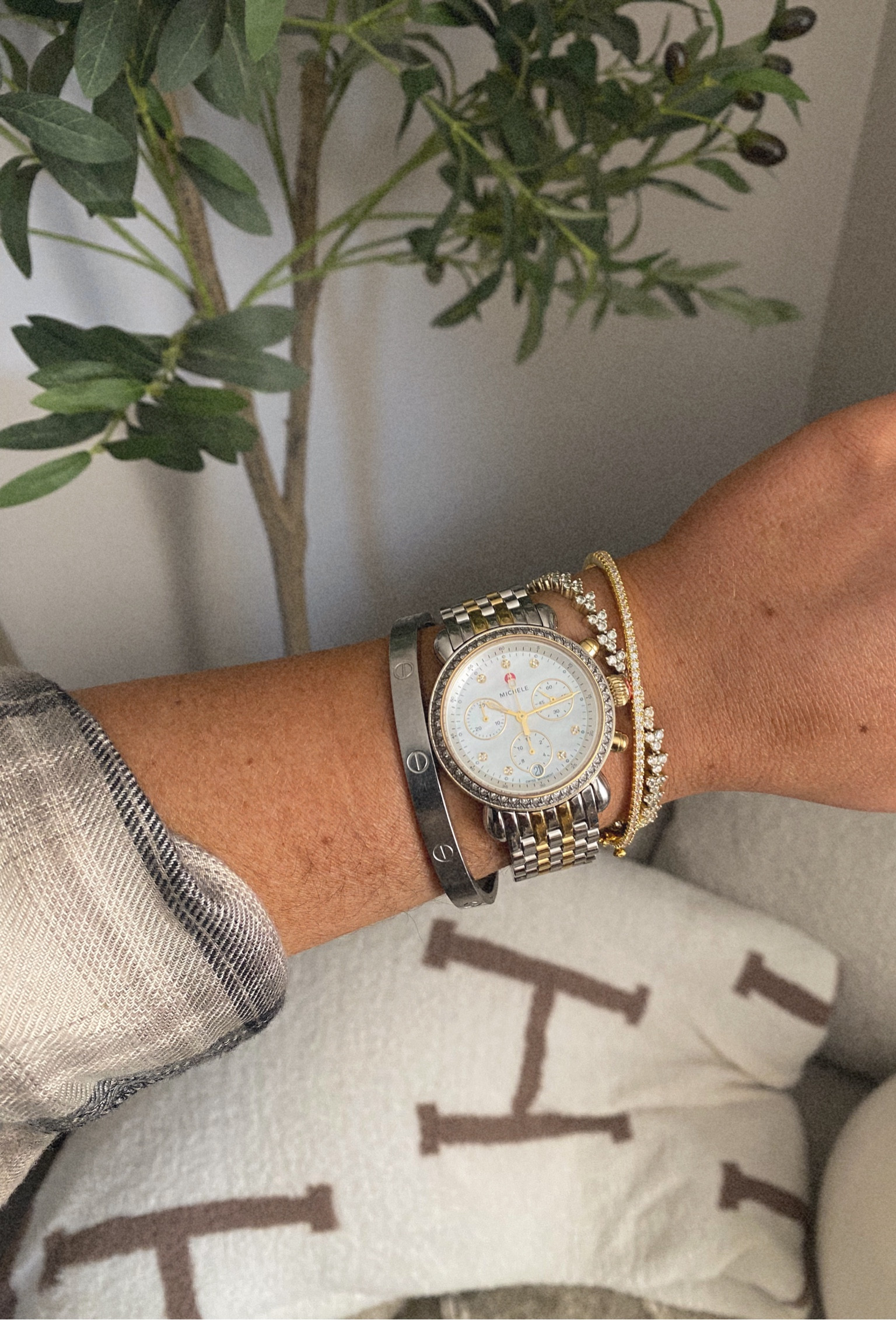 Amazon tennis bracelet + Nordstrom bangle ✨ Linked a similar Michele watch marked down 🫶🏼

#LTKStyleTip