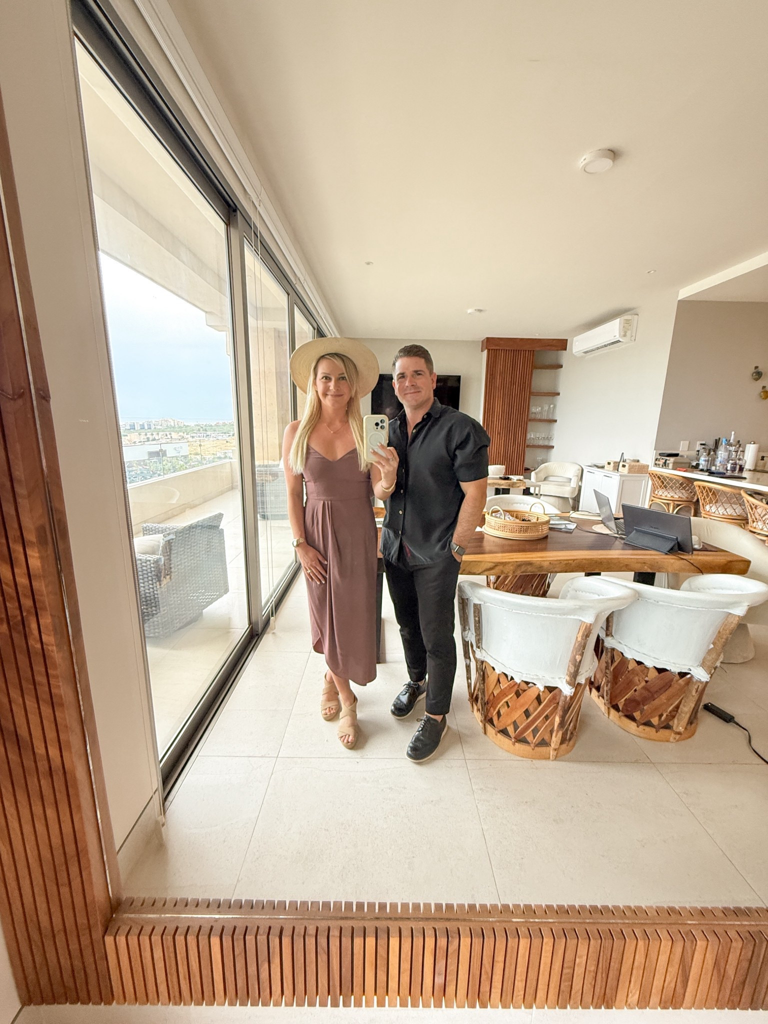 Neutral date-night looks in Cabo 🤎

My dress + hat combo is one of my go-to warm weather outfits — effortless, lightweight, &amp; easy to style. Richie kept it classic in a black button-down &amp; tailored pants for an elevated but relaxed resort look.

Linked both our outfits so you can shop the exact pieces (or similar) for your next trip.
Tap to shop our Cabo style ✨

⸻
couples vacation outfits, Cabo outfits, Cabo date night outfits, resort wear, neutral vacation outfit, brown dress outfit, wide brim hat outfit, women’s resort style, men’s resort outfit, men’s vacation style, black button down outfit men, Cabo style, travel outfit inspo, summer date night outfits, travel couple style, warm weather outfit ideas, minimalist outfits, neutral style, resort fashion, luxury travel style, beach vacation outfits, his and hers outfits, travel wardrobe, Cabo date night, elevated basics, effortless vacation style 

#LTKTravel #LTKMens