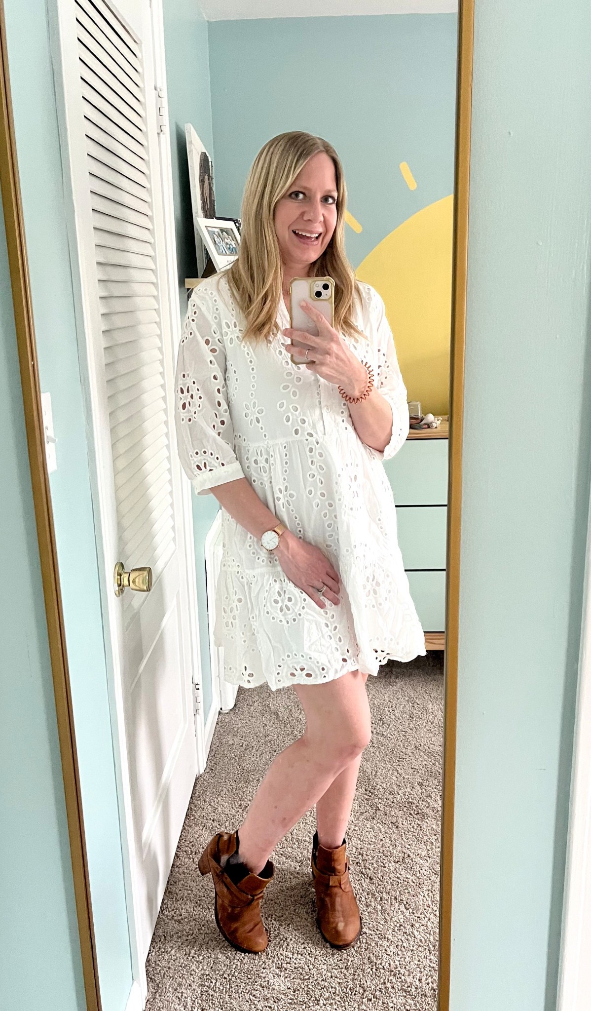 The best spring dress with sleeves! I grabbed this dress for my trip to Florida, which ended up being way too hot to wear but I decided to keep it because I thought it would be perfect for that in between weather up North when it’s not totally warm enough for short sleeves yet, but you still want to wear a dress. This would make a great Easter or Baptism dress option as well or even a pretty spring break outfit. The buttons make it nursing friendly. It was totally easy to breastfeed my babe while wearing this and it’s so comfy and not too short! It’s postpartum friendly and would be great to wear when you’re first sporting a teeny baby bump and aren’t quite in maternity clothes yet but are too uncomfortable to wear your regular fitting clothes. The white eyelet is so pretty for spring and would pair perfectly with some sandals and a straw purse. This would also make a really cute work dress, as it’s totally office appropriate !

#LTKBump #LTKSpringSale #LTKWorkwear