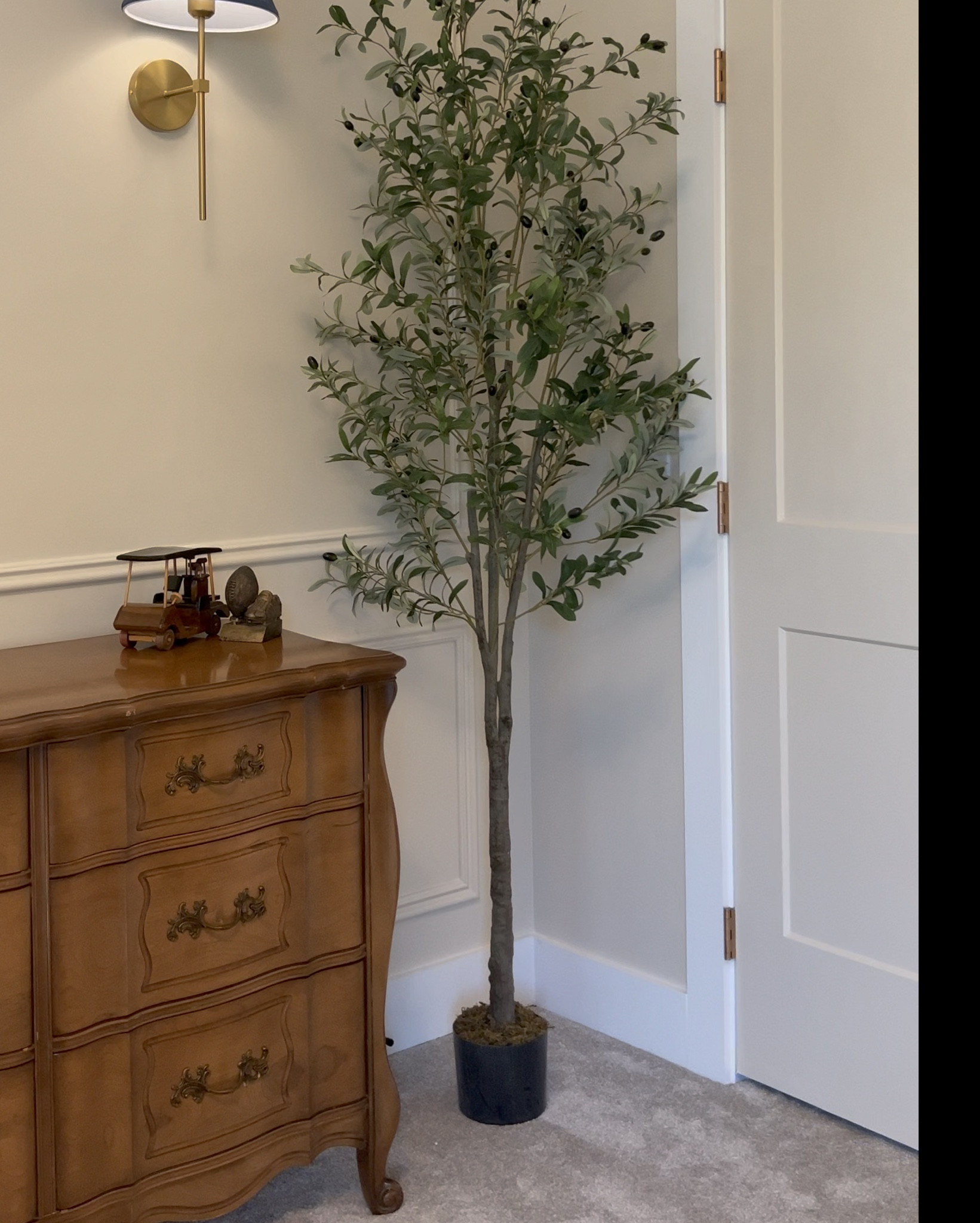 The perfect olive tree for our nursery and only $48.99 !!! Still looking for a pot I want it to go in  Also these sconces with the rechargeable lights are perfect! #nursery #boynursery #boynurseryinspo 

#LTKBump #LTKSaleAlert #LTKxPrimeDay