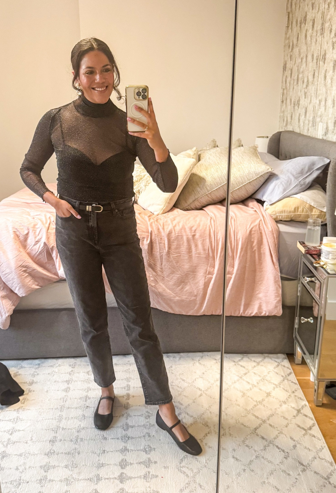 All black outfit, but make it fun! I layered a sparkly and sheer long sleeve top over a bra top shell and tucked it into washed black straight leg jeans. Paired with gold accessories and Mary Jane flats!

SIMKHAI top, size medium (has a lot of stretch)
Hanro bra top, size 36D (TTS)
Old Navy jeans, size 10T (TTS)
Nakamol earrings
Madewell flats, size 11 (run big)

#LTKStyleTip #LTKFindsUnder100 #LTKMidsize